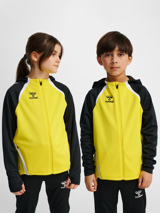 hmlLEAD 2.0 ZIP HOODIE KIDS, BLAZING YELLOW/BLACK, model