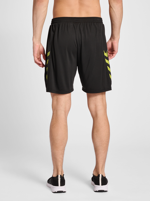 hmlONGRID POLY SHORTS, JET BLACK/DARK CITRON, model