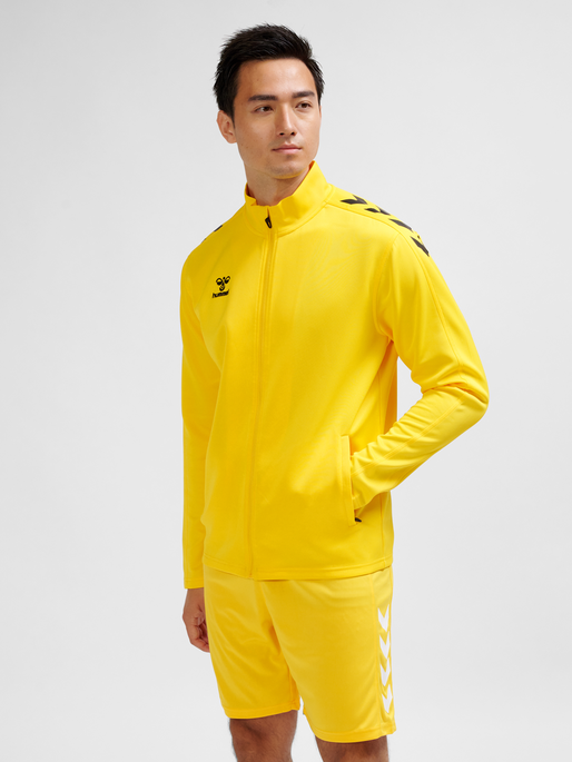 hmlCORE XK POLY ZIP SWEAT, SPORTS YELLOW, model