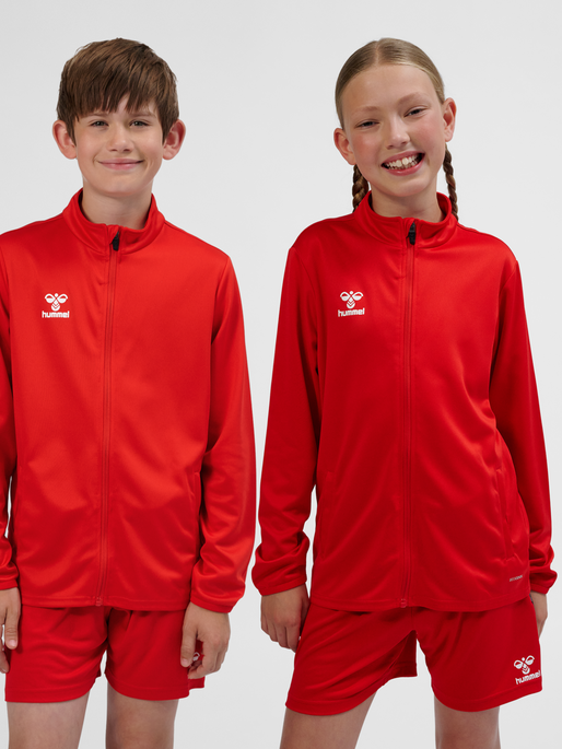 hmlESSENTIAL TRACK JACKET KIDS, TRUE RED, model