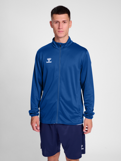 hmlESSENTIAL TRACK JACKET, TRUE BLUE, model