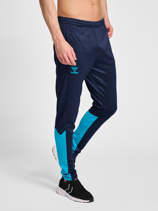 hmlONGRID POLY PANTS, MARINE/ATOMIC BLUE, model