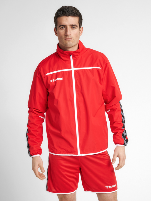 hmlAUTHENTIC TRAINING JACKET, TRUE RED, model
