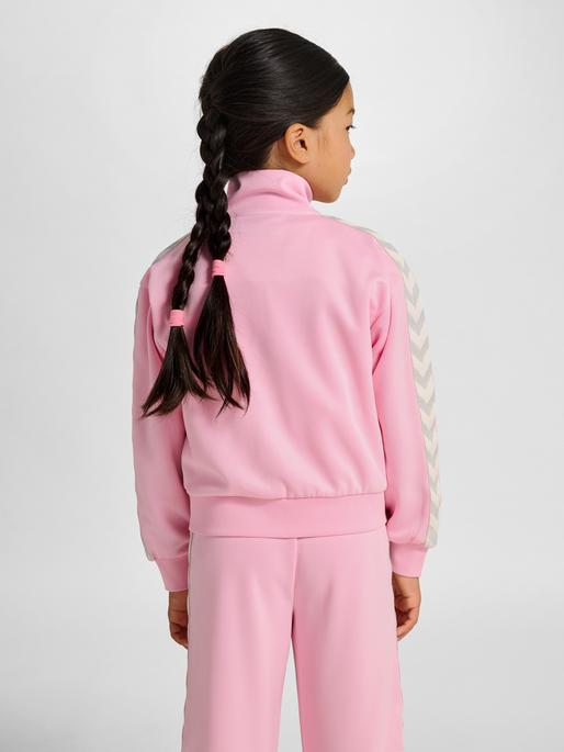 hmlJR REG POLY TAPE GIRL ZIP JACKET, ROSEATE SPOONBILL, model