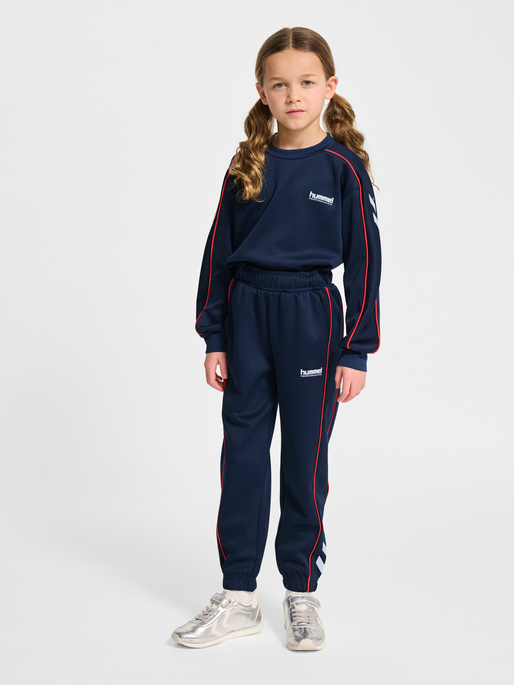 hmlJR INTERLOCK ADJUST PANTS, DRESS BLUES, model