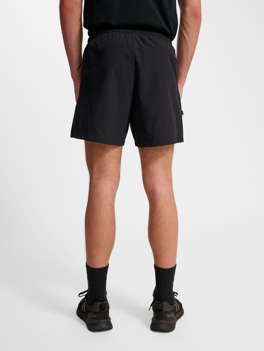 hmlPULSE SHORTS, BLACK, model