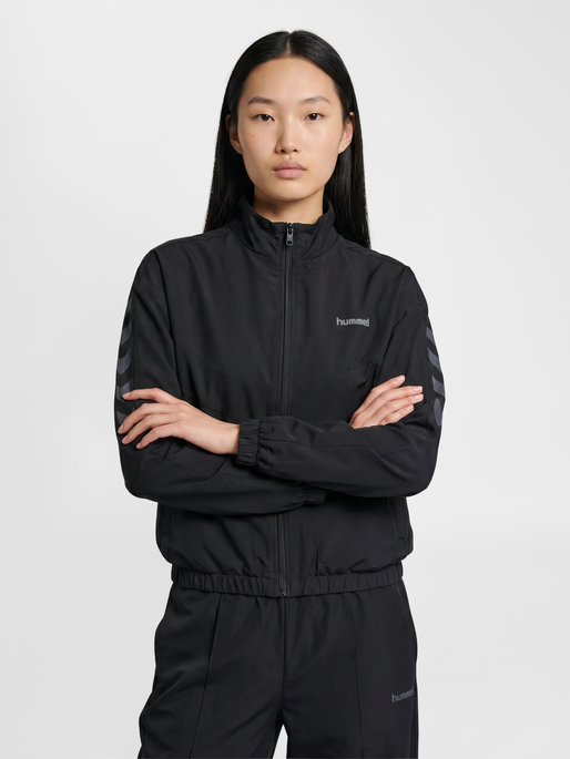 hmlARCHIVE W TRACK JACKET, BLACK, model